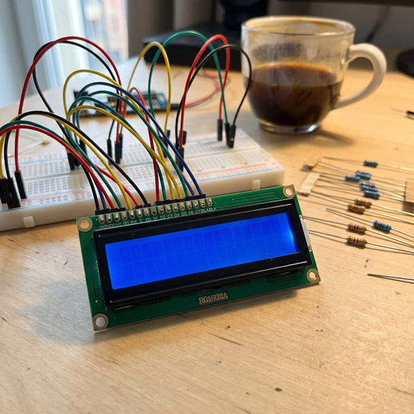 16x2 LCD display module connected in a breadboard project setup