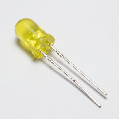 5mm yellow LEDs on workbench showing translucent lens and metal leads