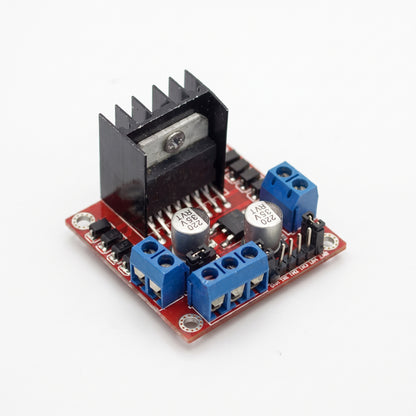 L298N motor driver module showing terminals and heat sink for robotics projects